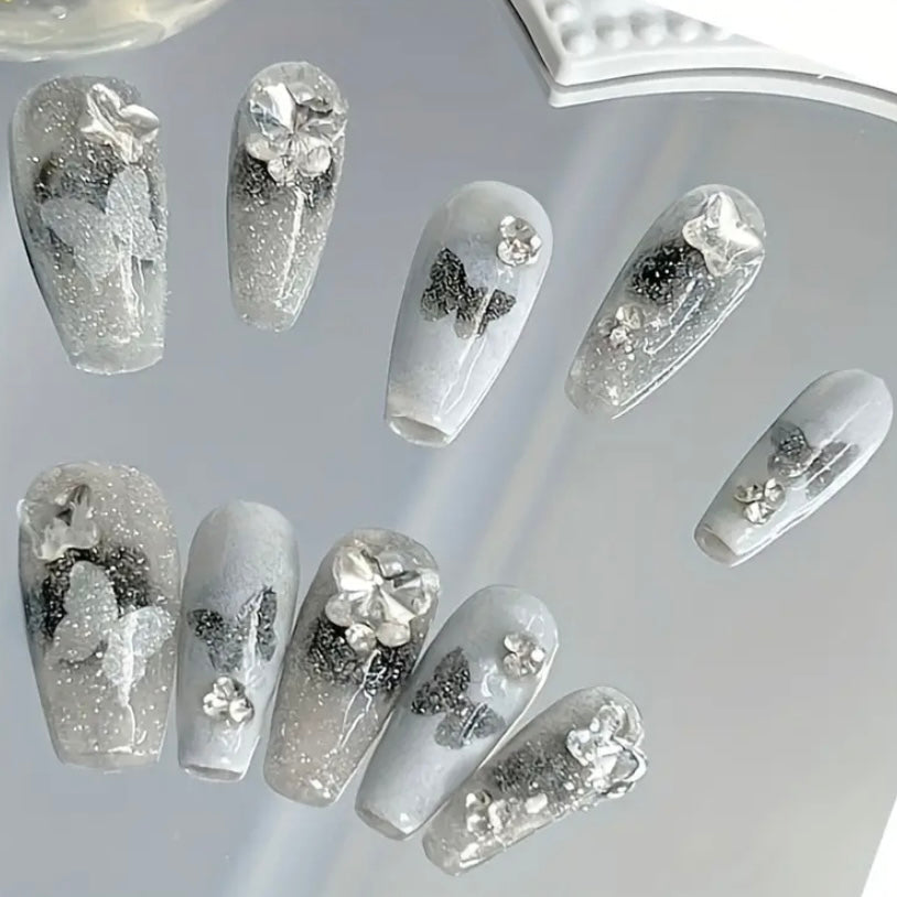 Long butterfly nails silvery