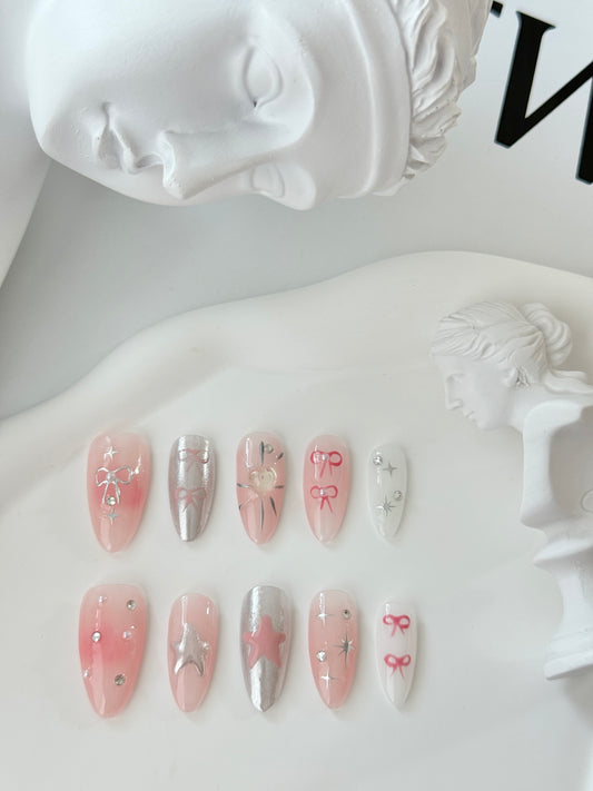 Long cute hand-painted nails pink