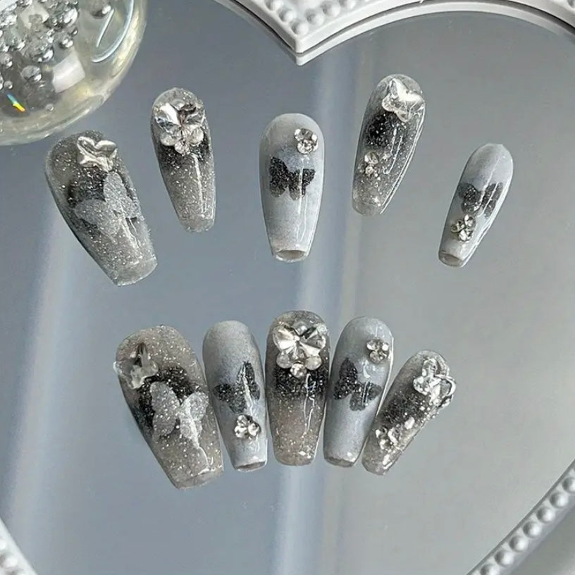 Long butterfly nails silvery