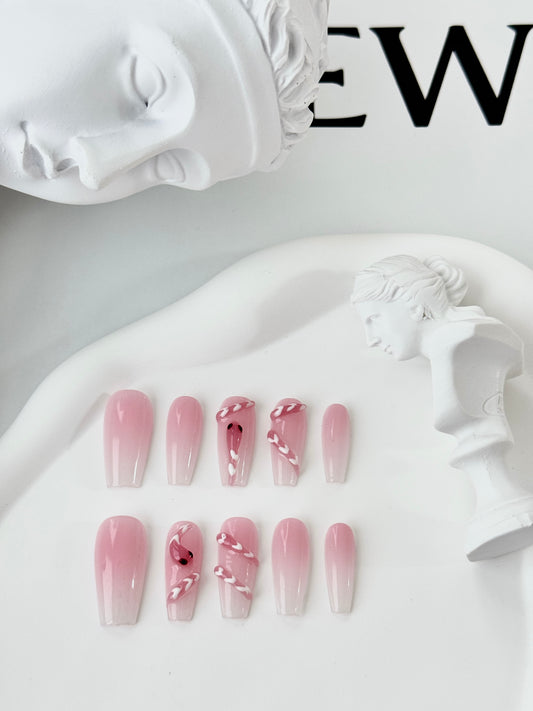 Long snake hand-painted nails pink