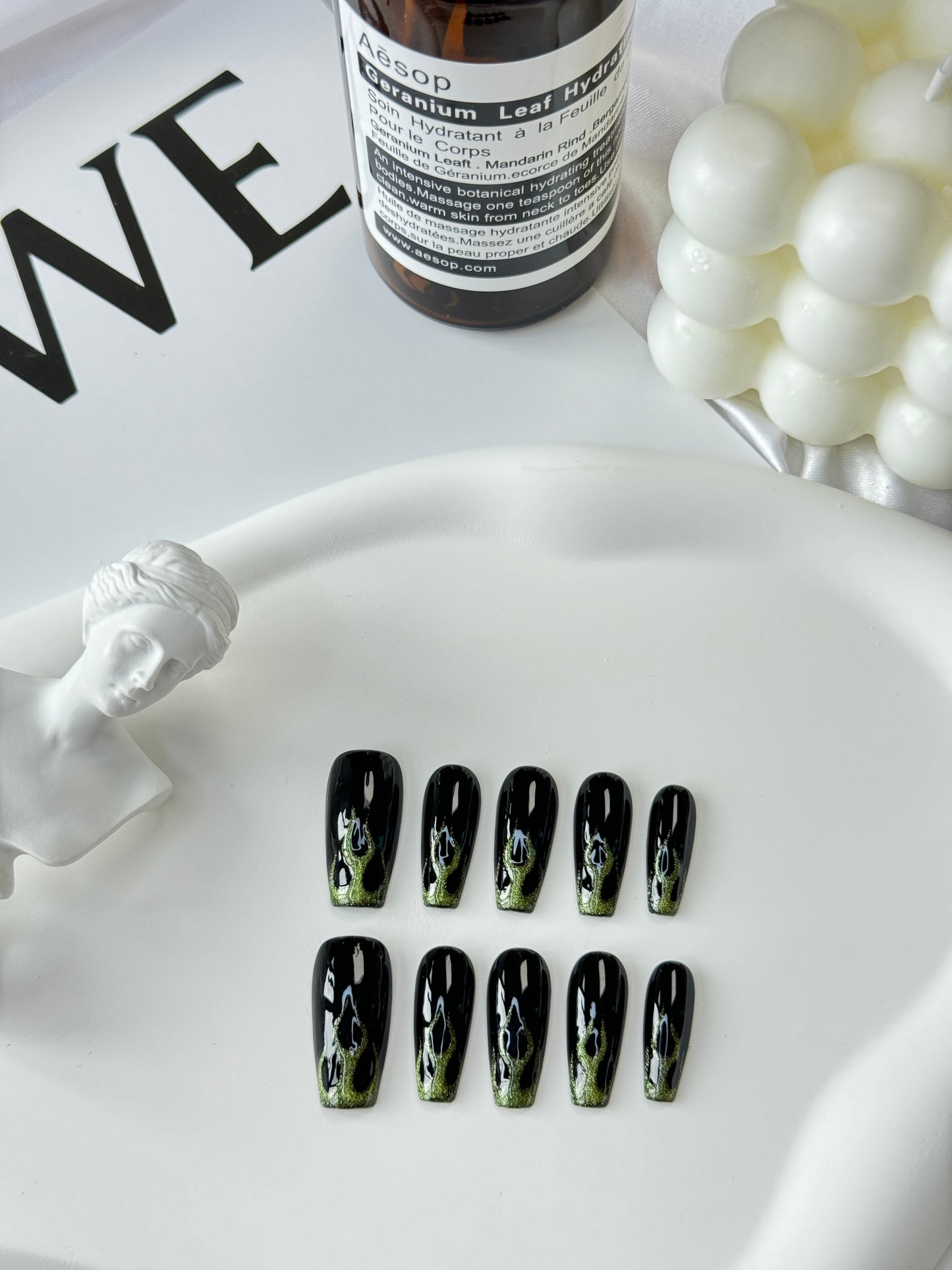 Long hand-painted fire nails black green