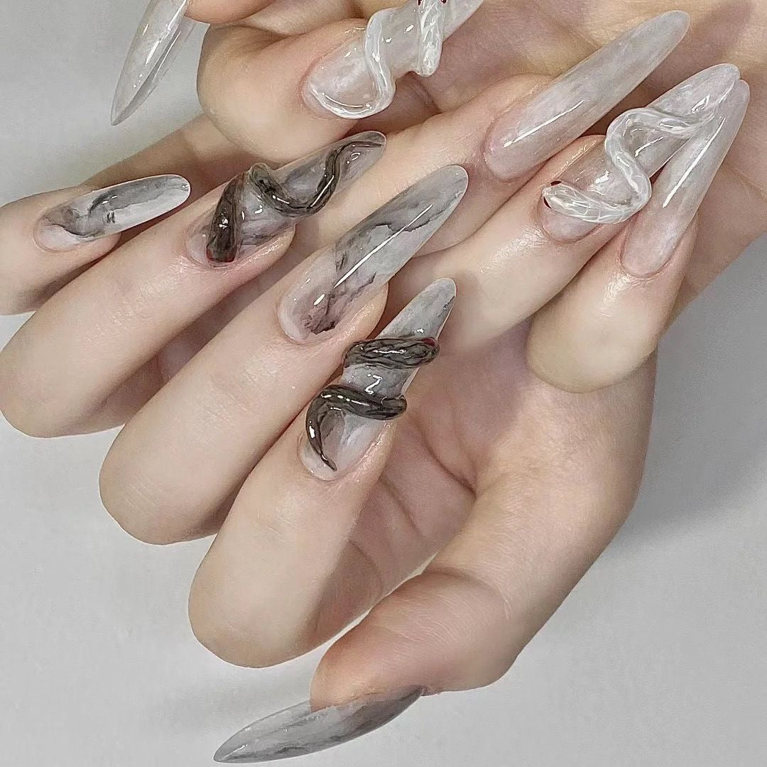 Superlong hand-painted snake nails black white