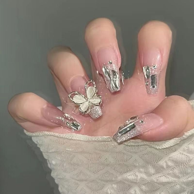 Long butterfly nails white