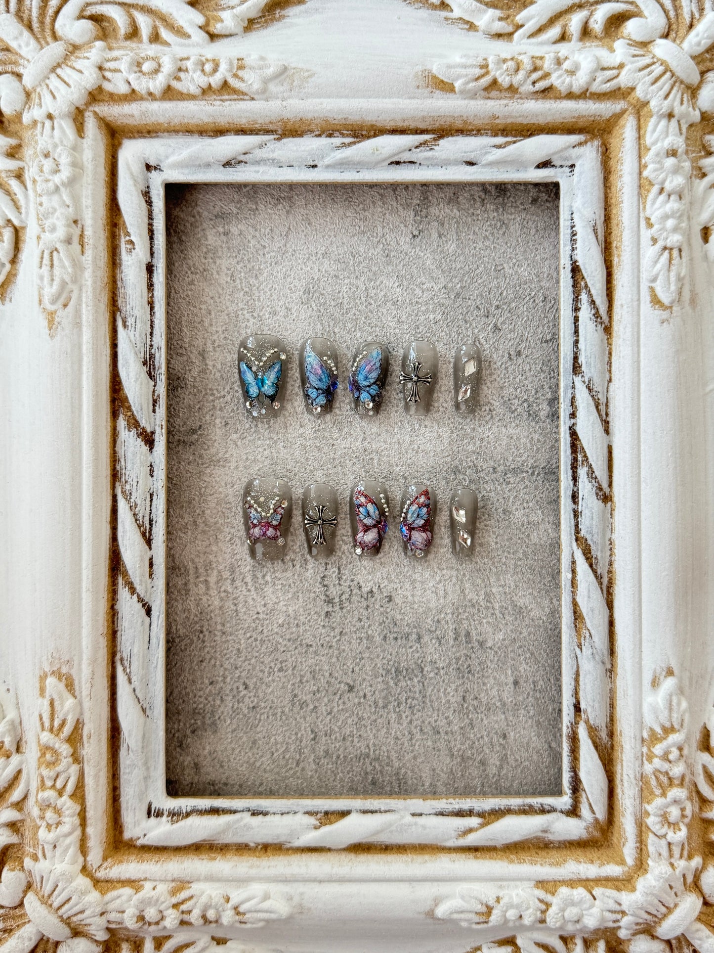 Medium length butterfly nails transparent grey blue and pink butterflies